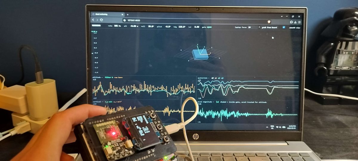 The estimator board in hand, running against live attitude and sensor traces